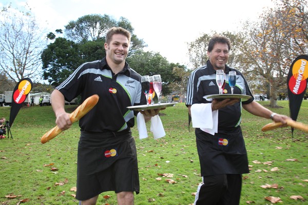  Don't give up your day job: All Black Richie McCaw and Rugby Legend, Buck Shelford, practice Waiter Racing ahead of the All Blacks MasterCard Roadshow